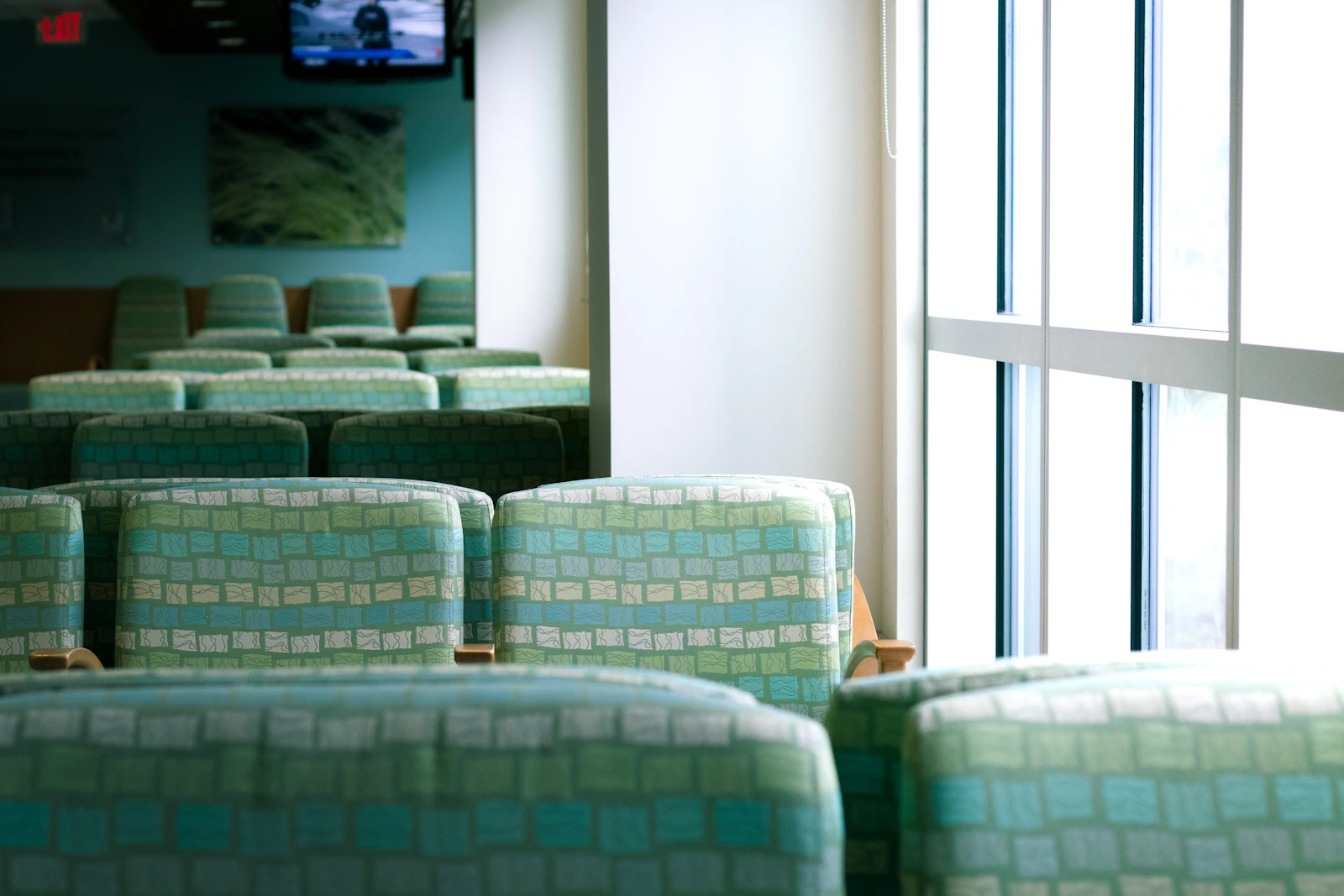 Green and white sofa chairs