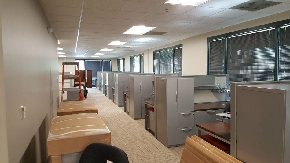 Installers reconfiguring an office
